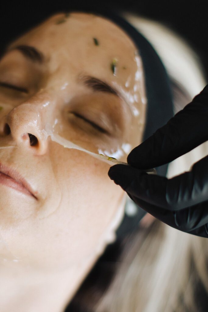 ONYX Beauty Lab | The Onyx Beauty Lab 2025 Holiday Gift Guide A woman receives a skin treatment from Onyx Beauty Lab.