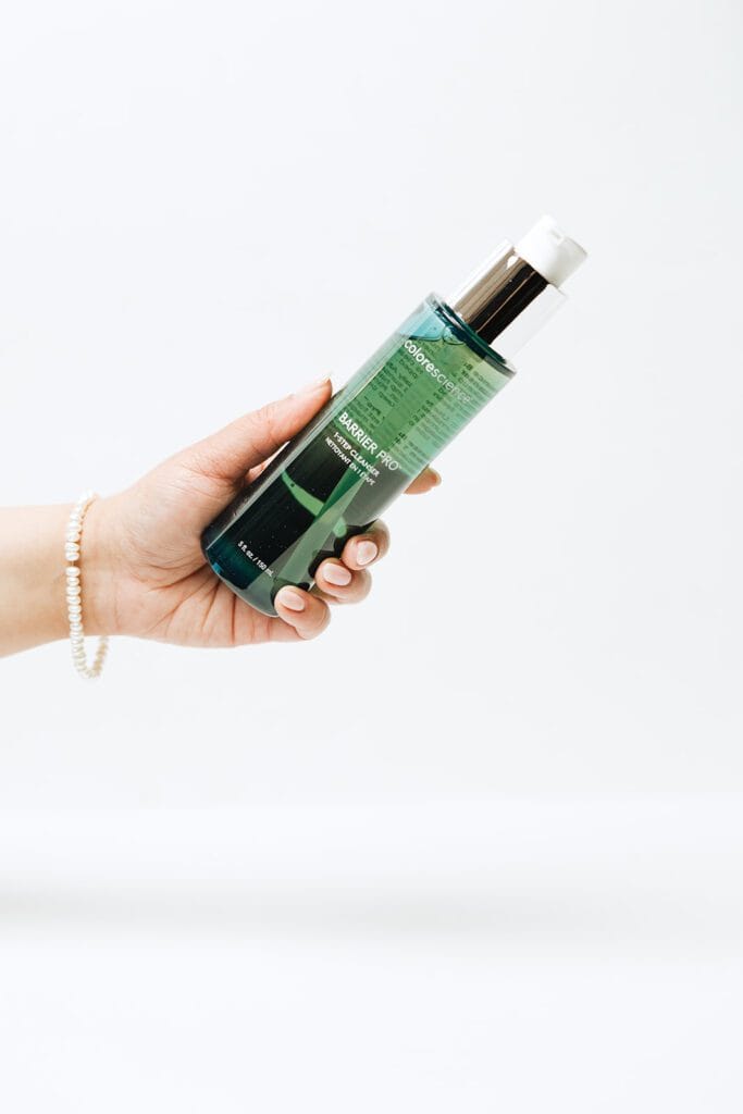 ONYX Beauty Lab | The Onyx Beauty Lab 2025 Holiday Gift Guide A hand holds Colorescience Barrier Pro 1-Step Cleanser