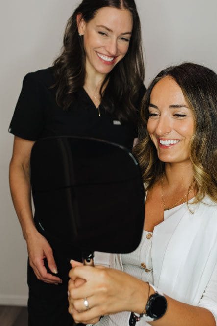 medical aesthetician with client